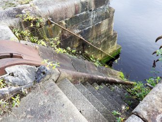 View of stairway and chute descending into graving dock no. 1 from its N side.