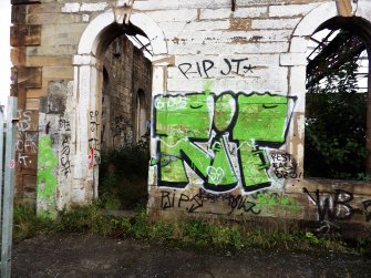 Example of graffiti on the walls (internal and external) of pump house standing on N side of graving dock no. 1.
