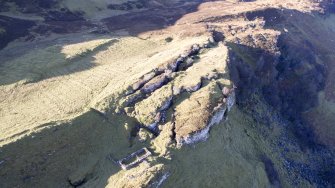 Oblique aerial view of the building and cultivation remains at Hallaig.