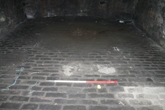 Historic building recording, Detail of floor, vault 14 from N, East Market Street Vaults, Edinburgh
