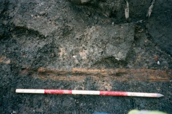 Wooden beam within (041), close up