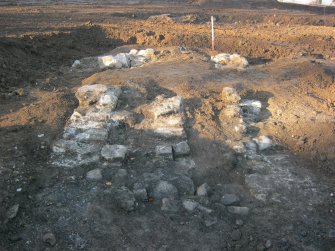 Excavation, Stone footings [012] and cobbling [011] from E, Craigpark Quarry, Ratho, Edinburgh