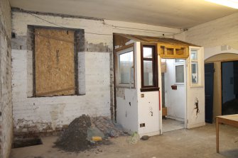 Historic building recording, Room 7, General view of N wall from SW, 24-26 West Harbour Road, Edinburgh
