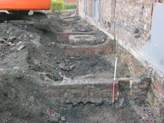 Archaeological evaluation, Trench 3, General view of brick interior foundation wall from SW, 4-5 West Park Place, Edinburgh