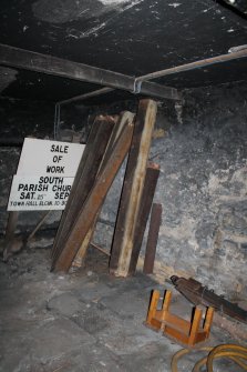 Historic building recording, Room -1/1, Detail of guttering lying against the NE wall from N, Elgin South Parish Church, Moray Street, Elgin