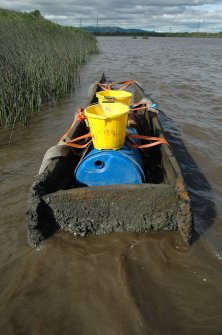 Excavation photograph, Carpow Log Boat, Carpow Bank, Recovered vessel on bank