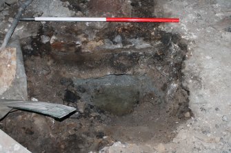 Historic building recording, Basement, Room -1/4, Detail of previously excavated test pit in NW corner from S, Former United Presbyterian Church, 17-21 Blackfriars Street, Edinburgh