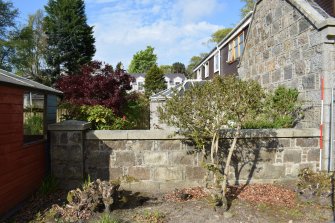 Standing building survey photograph, Inchgarth Lodge and Steading, Garden wall