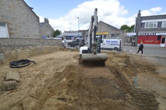 Watching brief photograph, 61 West High Street, Inverurie, Site during removal of spoil heap, nearing
completion. Note thin lens of topsoil overlain by imported gravels