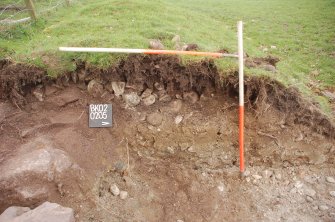 Archaeological Evaluation photograph, Lower Gauls Barrow, Bank material 0205, in E-facing section of Trench 02