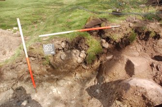 Archaeological Evaluation photograph, Lower Gauls Barrow, Bank material 0205, in W-facing section of Trench 02