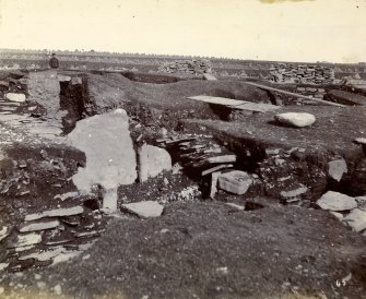 Photograph of Keiss Road Broch, large slab, secondary buildings.