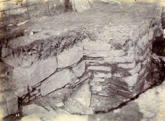Photograph of Keiss Road Broch, corner of the encircling wall to the right.