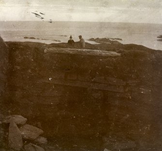 Photograph of man and a woman standing on top of Elsay Broch. 