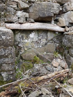 View from NE of an alcove in the SW end of the compartment at the SW end of the farmhouse.