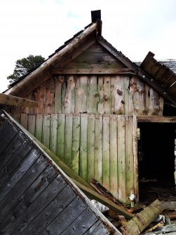 View from SE of the modern timber partition wall between the barn and the SW end of the byre.