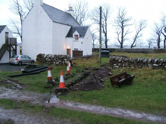 Watching brief, W half of main trench with old manse on the left from E, Underground Power Supply, Clachan Church, Applecross