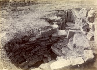 Photograph, Keiss Road Broch, underground habitations outside.  