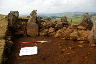 Excavation, Trench A, Black surface under paving from W, Blasthill Chambered Tomb, 2009