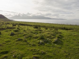 Laig, Eigg. View of square cairn (198) from S. 