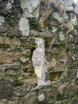 Eigg, Kildonan Church. Detail of N window showing surviving sandstone margins. 