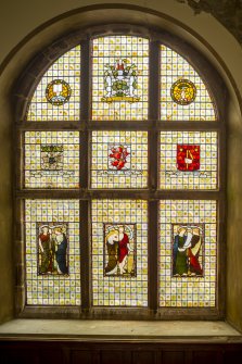 General view of stained glass window in main stairwell.