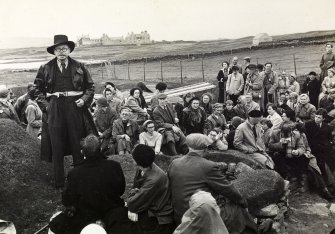 View of group at Skara Brae inscribed 'Childe lecturing at Skara Brae'