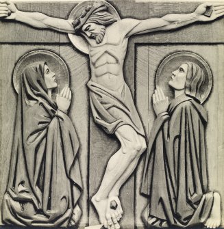 Detail of carved oak panel showing the Crucifixion on nave ceiling, St John's Church, Perth.

