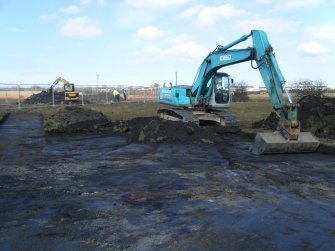 Watching brief, Working shot showing re-deposited coal/shale below topsoil from NE, M8 enabling works, Coatbridge