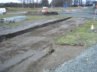 Watching brief, View of compound 1 topsoil strip from W, M8 enabling works, Coatbridge