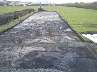 Watching brief, Main track topsoil strip showing disturbed ground from N, M8 enabling works, Coatbridge