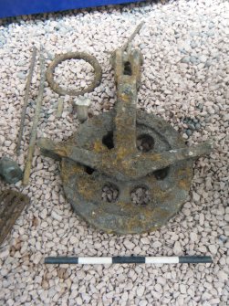 Archaeological monitoring, Detail  of pulley wheel recovered from the bank, Southbank Road, Kirkintilloch