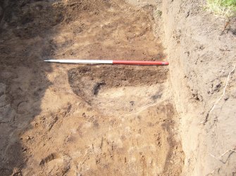 Archaeological evaluation, Trench 12, E facing section of posthole [1] (2) from W, Seton Sands, East Lothian