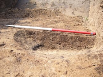 Archaeological evaluation, Trench 12, E facing section of posthole [1] (2) from W, Seton Sands, East Lothian