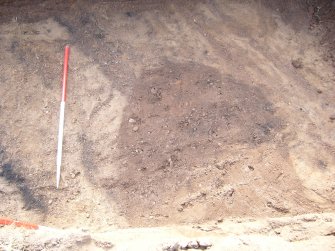 Archaeological evaluation, Trench 13, view to SE showing unexcavated pit [1] (2) and linear features from SE, Seton Sands, East Lothian