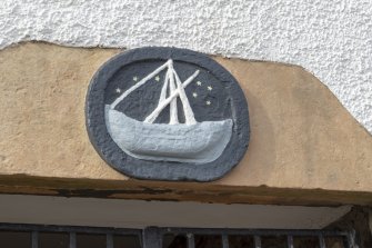 Craill, Customs House, detail of lintel with fishing smack