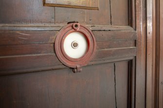 Detail of bell push in hall.