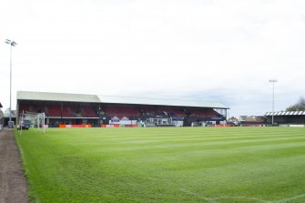 General view of the football pitch to the main stand taken from the north east.