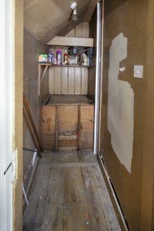 Interior view showing small coal cupboard on second floor, Brechin Castle.