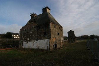 Historic building survey, W- and S facing elevations from a distance, Pathbrae Maltings Building, Kirkliston