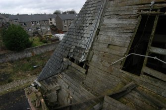 Demolition watching brief, W elevation roof sarking boards and slates cut by former roofline, Pathbrae Maltings Building, Kirkliston