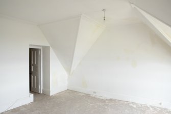 Interior.  Second floor room showing roof structure.