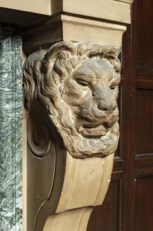 Interior.  Ground floor.  Hallway.  Fireplace.  Detail of decorative lion heads.