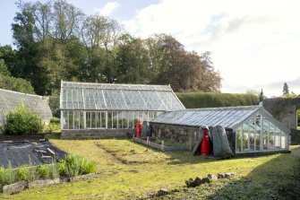 View from south showing garden buildings and glasshouses, Brechin Castle.