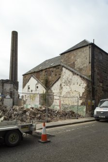 View from south-east showing partial demolition of rear buildings off Foundry Street at Pilmuir Works, Pilmuir Street, Dunfermline