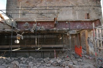 Elevation recording, General shots of the W-facing gable of No 90 Princes Street, structural steel beams during demolition at second floor level, Primark Store, 91-93 Princes St Edinburgh