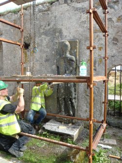 Archaeological works, Stone 1 undergoing removal, St Columba's Chapel, Aiginis, Isle of Lewis