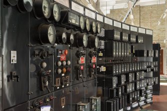 Interior.  Turbine Hall. Mezzanine/First floor.  View of original control panel from 1933