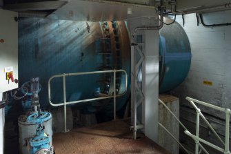 Interior. Turbine Hall. Basement floor. West Pipe/Penstock supplying water to generator set No.2, as it enters the power station