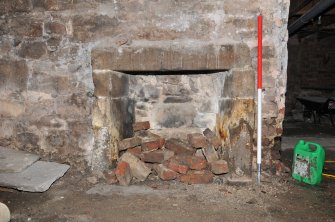 Standing building appraisal, Room 1/5, Stone fireplace on the E-facing elevation, at S end, 85-87 South Bridge, Edinburgh